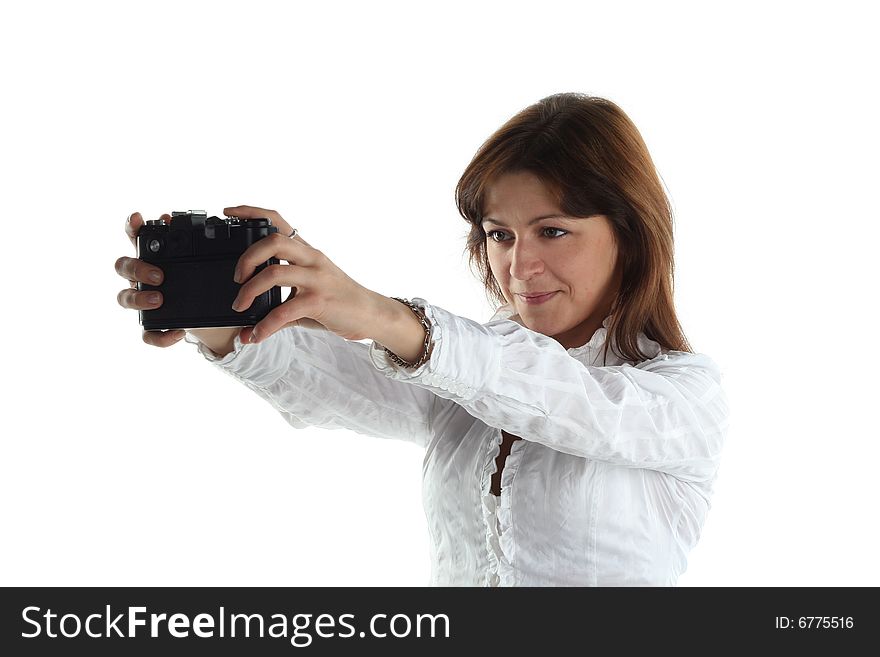 Young woman with old camera isolated on white background