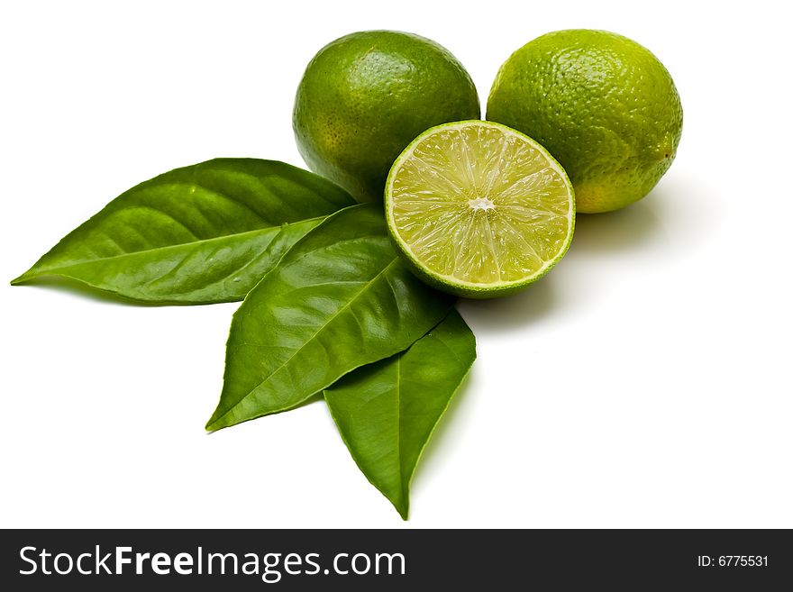 Green limes isolated on white