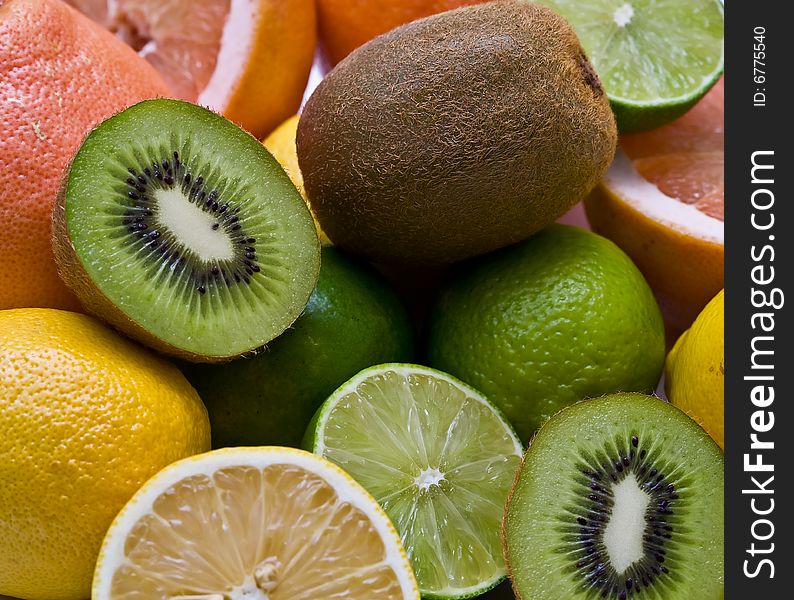 Kiwi, lemon, lime and grapefruit close-up. Kiwi, lemon, lime and grapefruit close-up