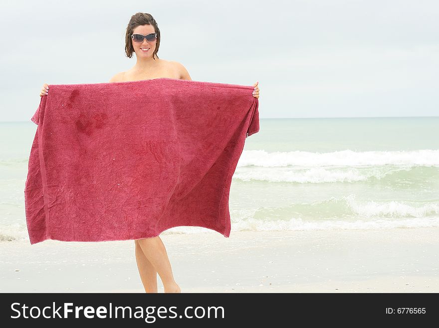 Naked Woman Covering Up With Towel