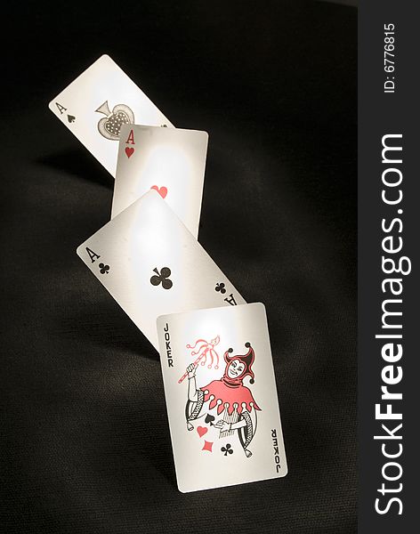 Playing cards in line, with a black background. Playing cards in line, with a black background