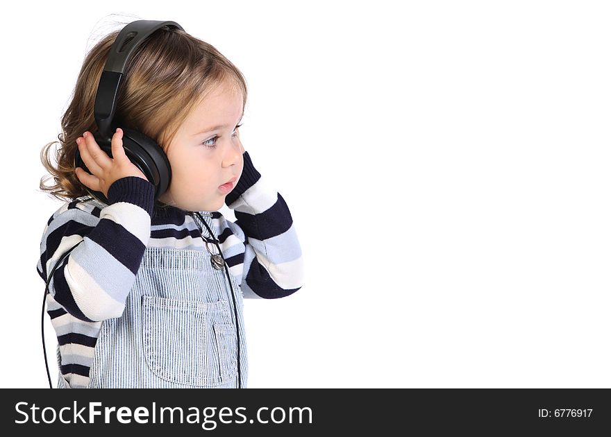 Beauty a little girl listening music on white background