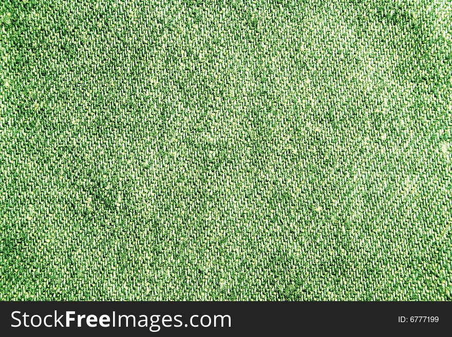 A piece of a green jeans