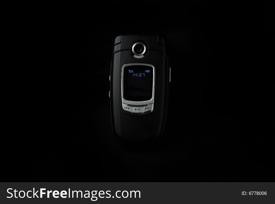 Luxury black phone on a dark background. Luxury black phone on a dark background