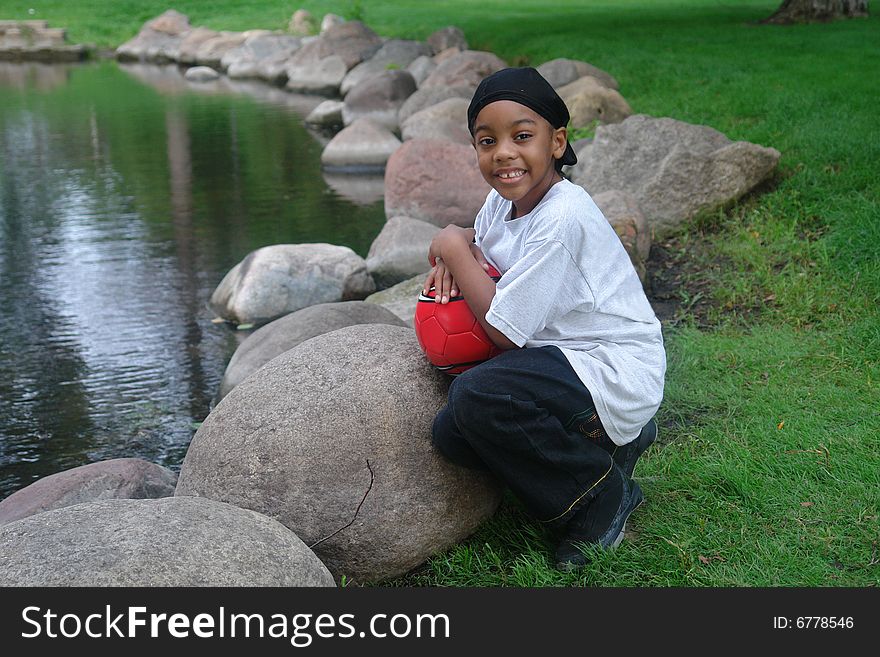 A picture of an outdoor portrait of young boy. A picture of an outdoor portrait of young boy