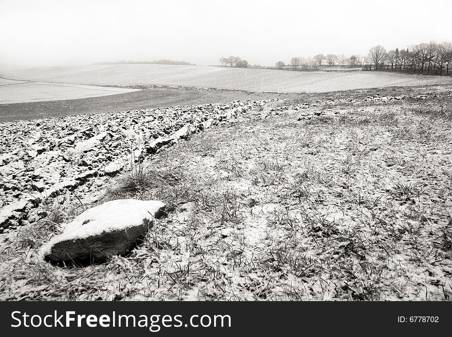 Snowfall Landscape with Stone and Fog. Snowfall Landscape with Stone and Fog