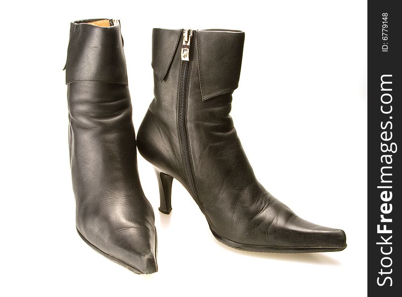 High heeled black zip up dress boots. High heeled black zip up dress boots