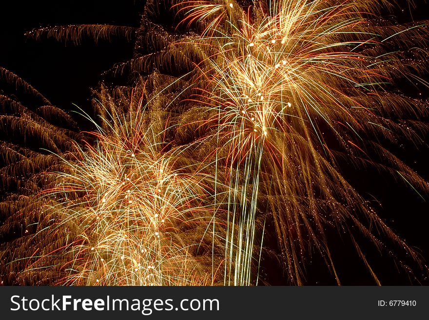 Bright colored fireworks on black background