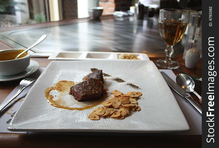 Steak and goose liver at a local famous restaurant