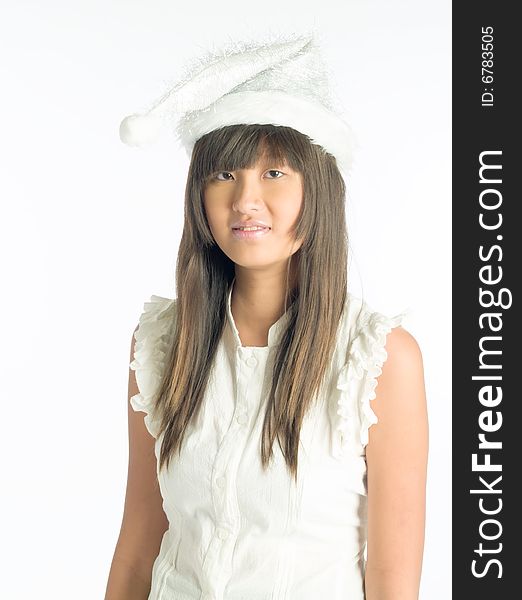 Tall girl in silvery christmas hat ready to party