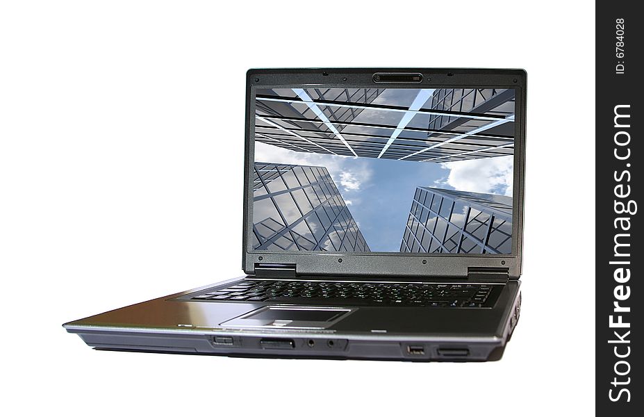 Laptop with modern building on desctop. Laptop with modern building on desctop