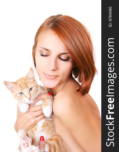 Beautiful redhead girl with red fluffy kitten. Beautiful redhead girl with red fluffy kitten