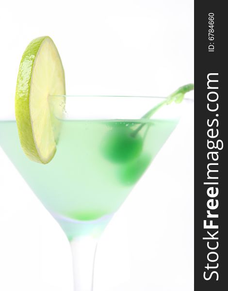 Fresh green cocktail (lime in focus)