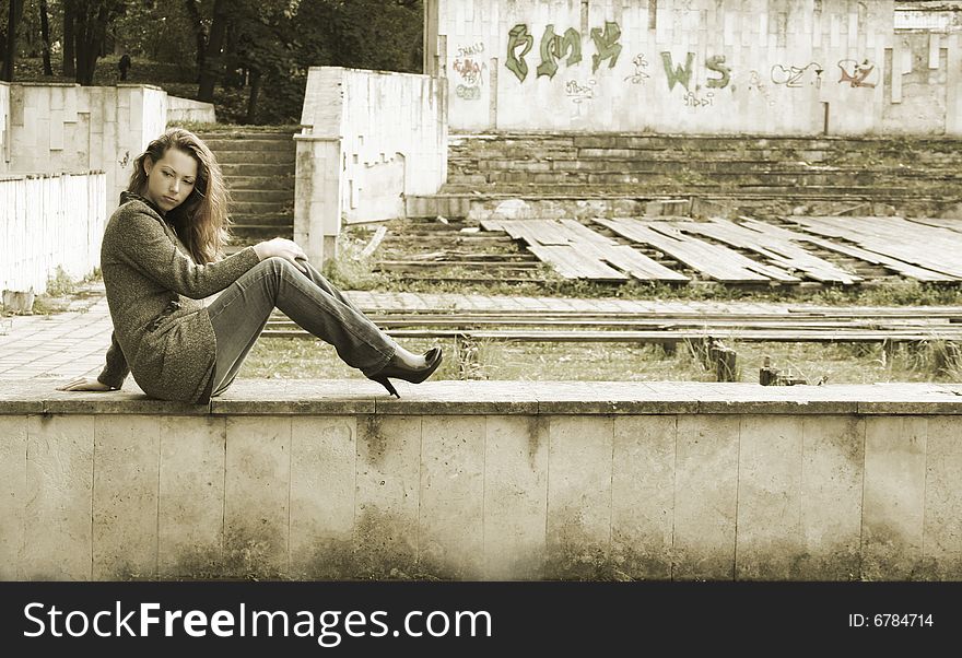 Lonely girl in autumn park. Lonely girl in autumn park