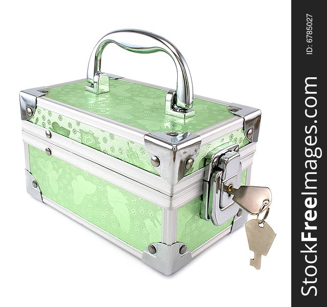 Light green trunk with keys isolated on a white background