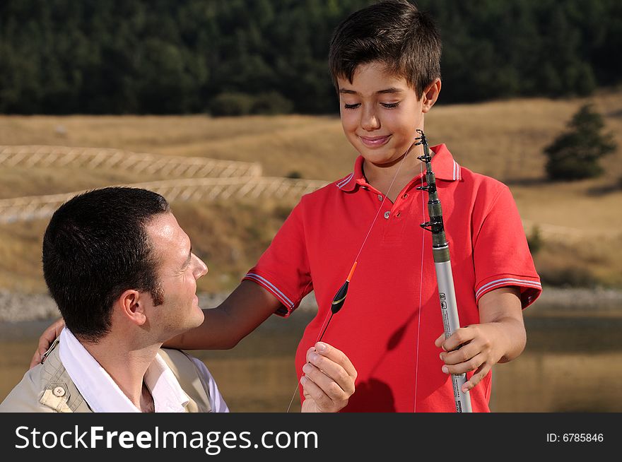 Father with son and free time, adult man teach operation fishing