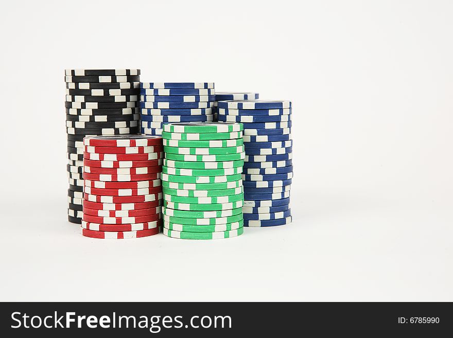 Amount of variable poker chipes isolated on white background. Amount of variable poker chipes isolated on white background