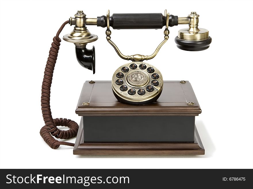Antique telephone with brown button. Antique telephone with brown button