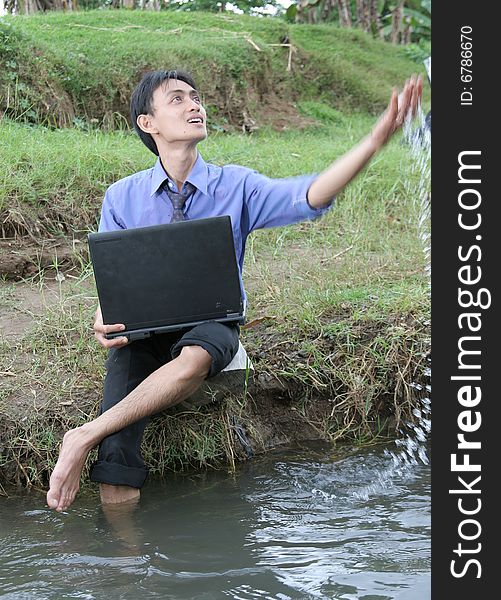 Business man working on laptop and enjoy nature. Business man working on laptop and enjoy nature