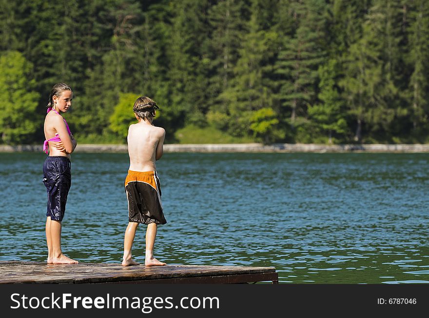 Children Playing In The Lake