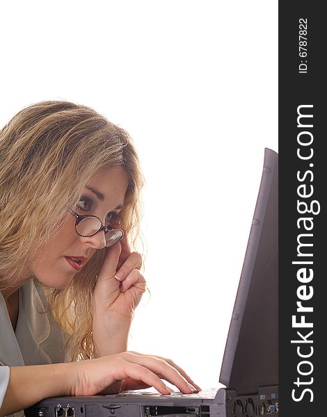 Shot of a woman looking at computer up close