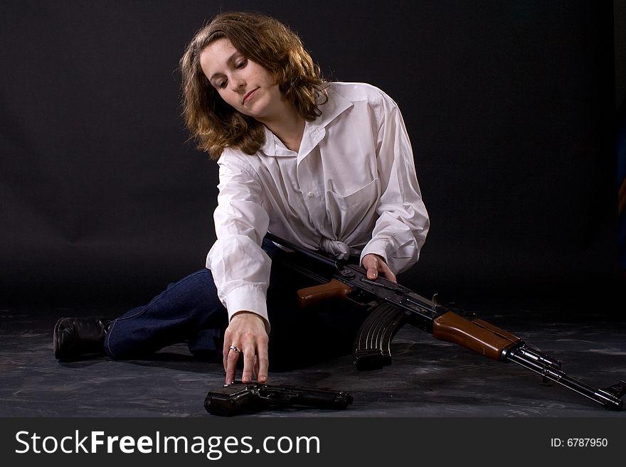 Woman with guns