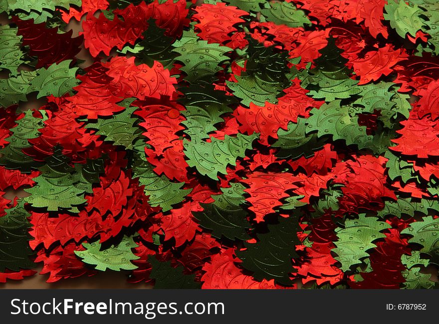 Christmas background from green and red christmastrees