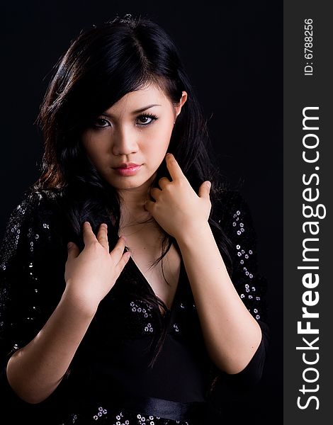 Asian Girl In Black Cocktail Dress