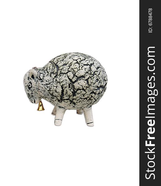 Stone sheep with bell on white