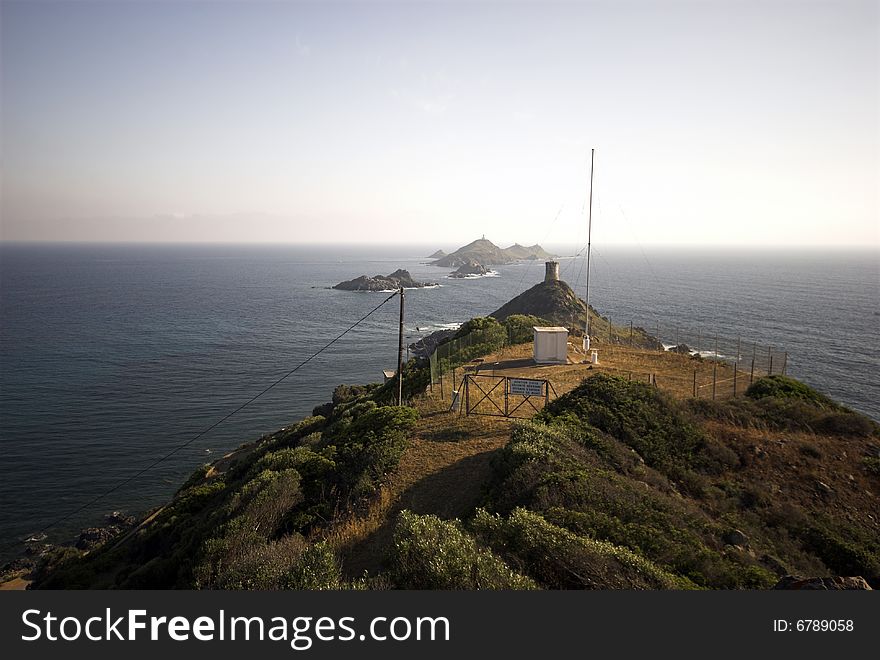 Mediterranean Coastline.
Sanguinaire islands and Parata Tower in Corsica, France. Near Ajaccio in the Mediterranean Sea.