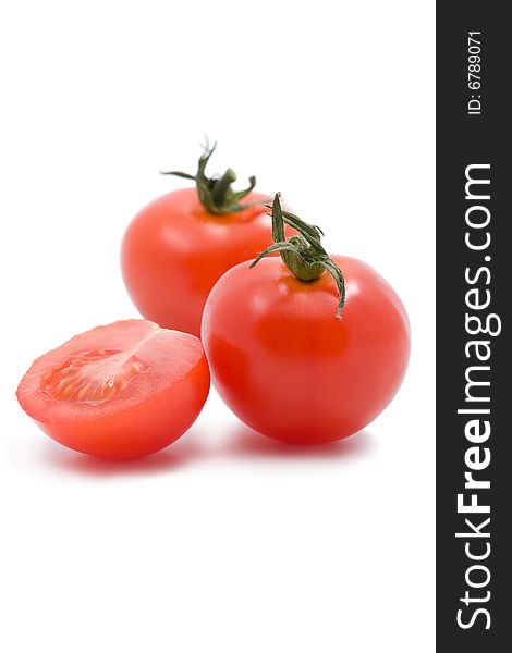 Ripe tomatoes cherry isolated on white. Ripe tomatoes cherry isolated on white