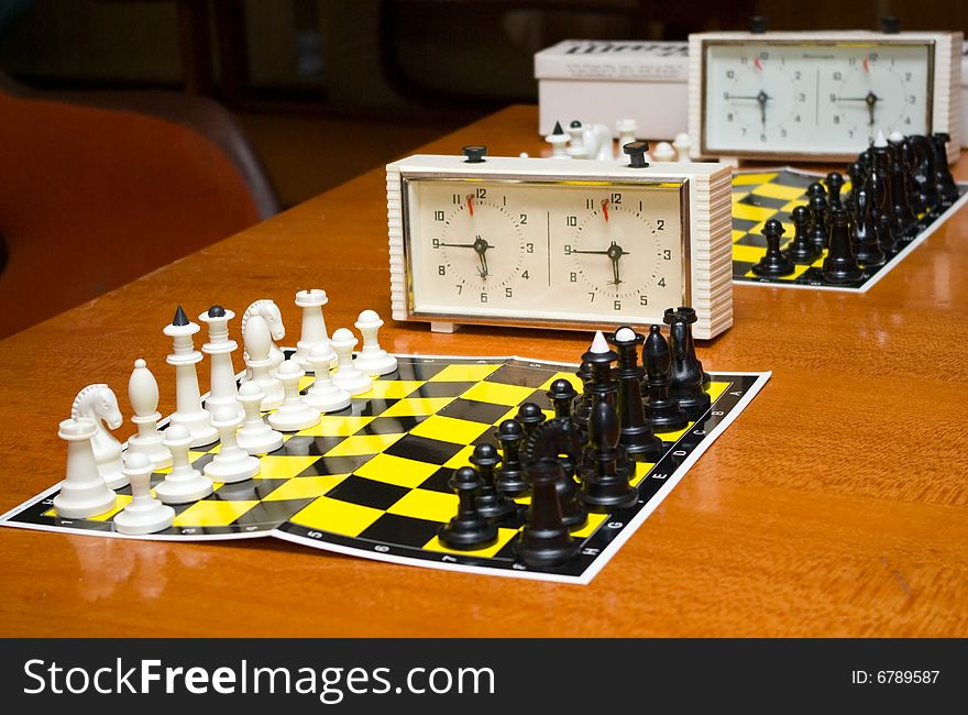 Black and white chess on a chessboard before a game