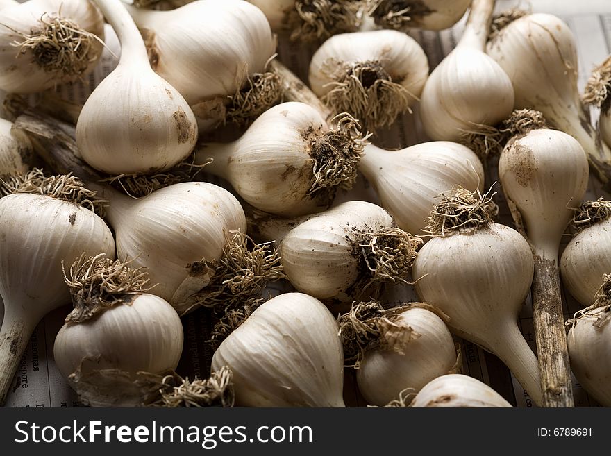 Heap of fresh garlic background