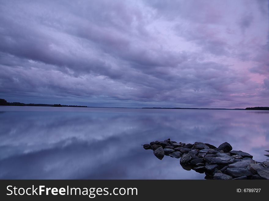 Lake in Finland in the evening light. Lake in Finland in the evening light