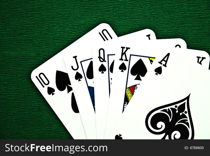 Playing cards on a green background. Playing cards on a green background
