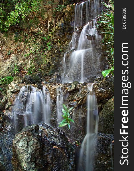 Beautiful summer waterfall over rocks. Beautiful summer waterfall over rocks