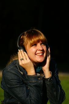 Girl With Headphones Laughing Stock Photos