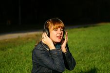 Girl With Headphones Singing Royalty Free Stock Photos