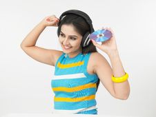 Asian Woman Listening To Music Stock Photo Asian Woman Listening To Music Stock Photo