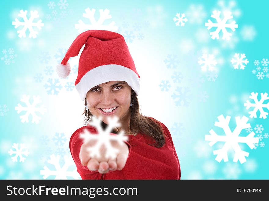 Santa woman holding small snowflake in the hand over blue background