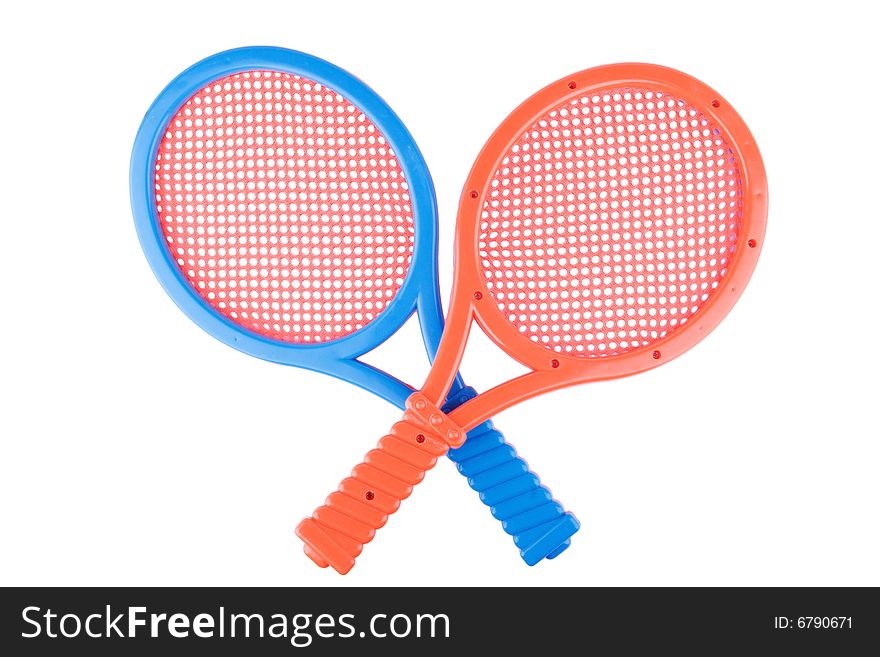 Pair of plastic rackets on white