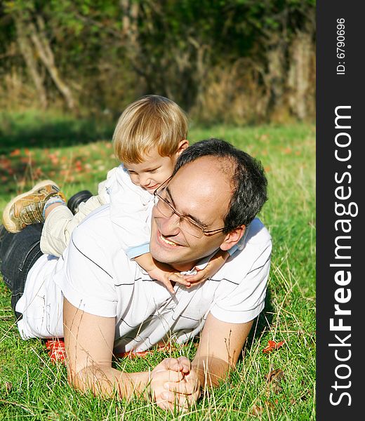 Father and son outdoor portrait