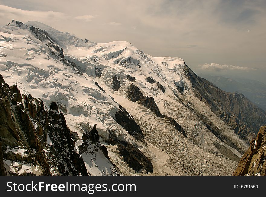 Stony and glacial slopes of Mountain Mont Blanc in France in the summer