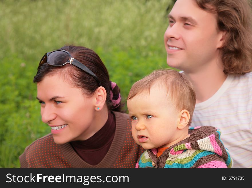 Parents With Child On Nature