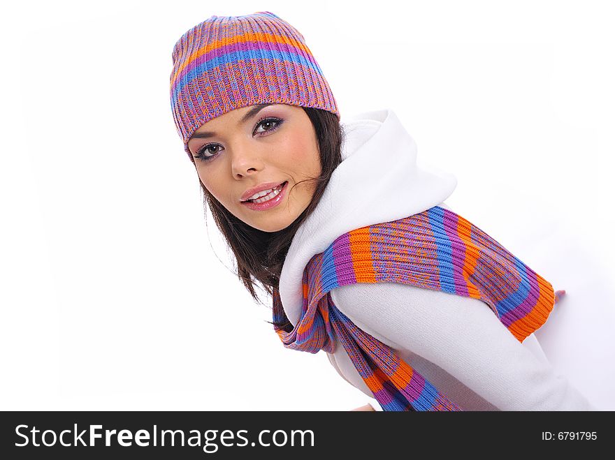 Sexual girl in a multicolor hat and gloves. Winter fashion. Sexual girl in a multicolor hat and gloves. Winter fashion.
