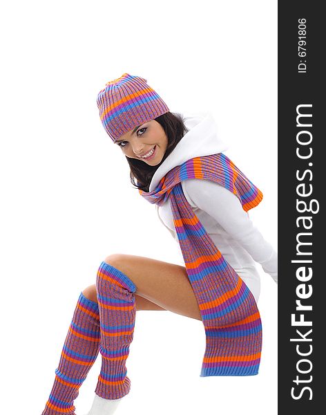 Sexual girl in a multicolor hat and gloves. Winter fashion. Sexual girl in a multicolor hat and gloves. Winter fashion.