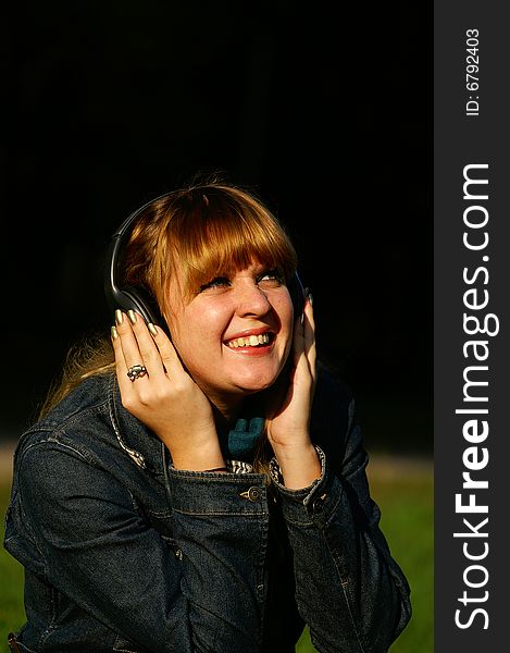 Girl With Headphones Laughing