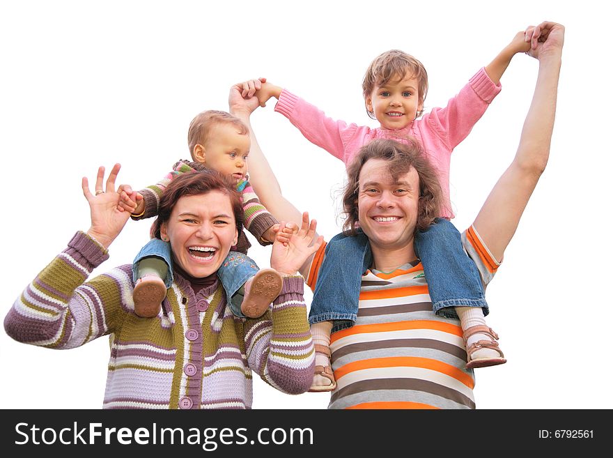 Two parents with children on shoulders