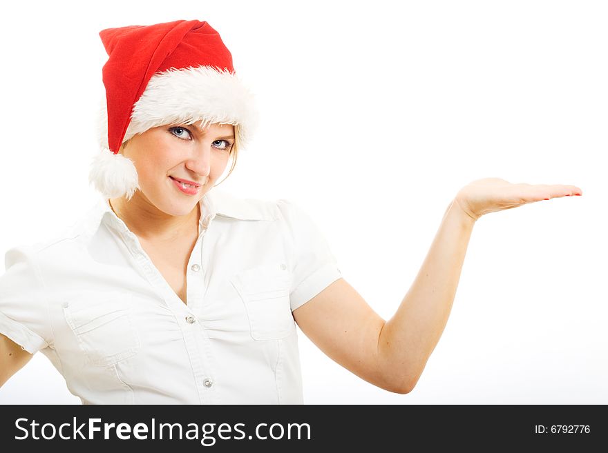 Young beautiful girl in Santa hat. Isolated on white.