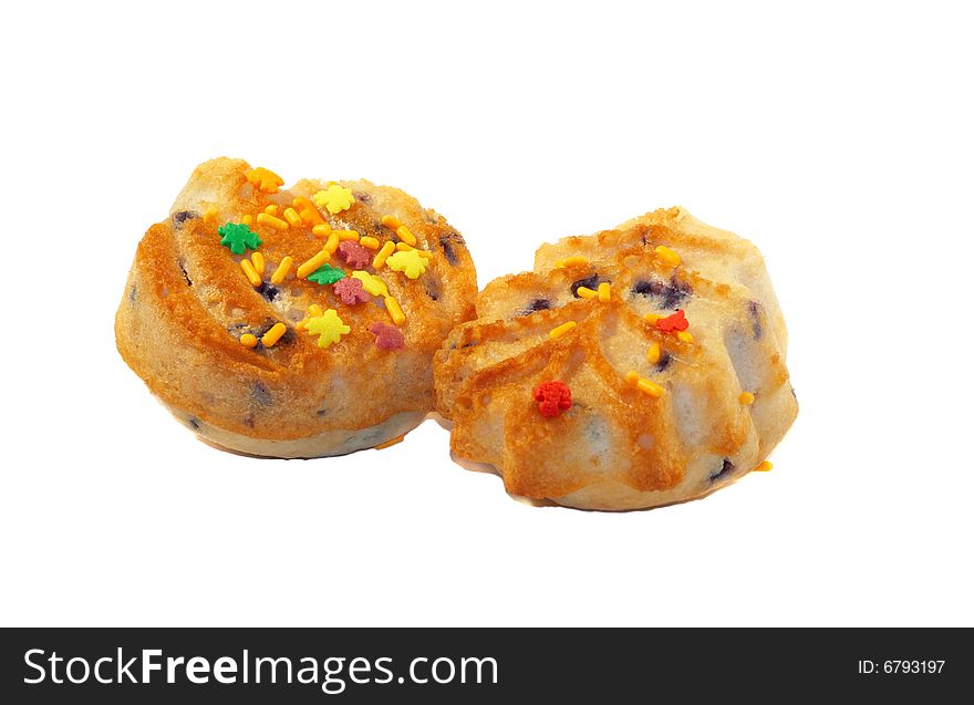 Two isolated handmade fruit-cakes for party. Two isolated handmade fruit-cakes for party.